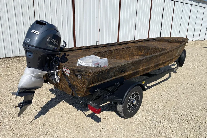 Slide: The Image of 2026 G3 16DK boat with Yamaha 40 engine on trailer, parked outdoors. - 4