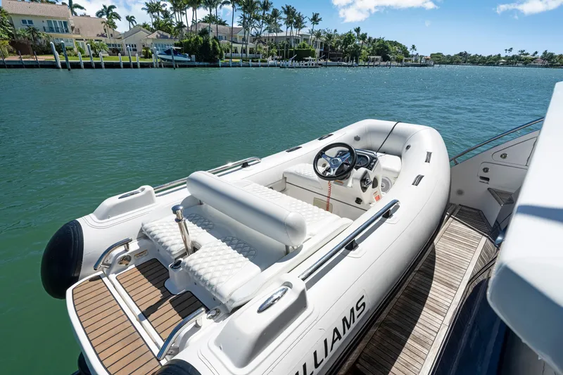 Slide: The Image of Luxury yacht Azimut 60 Fly 2020 with tender boat on scenic waterway. - 12