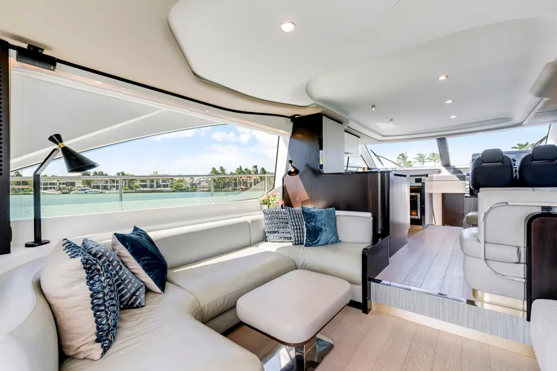 Slide: The Image of Luxurious interior of 2020 Azimut 60 Fly yacht with elegant seating and scenic views. - 17