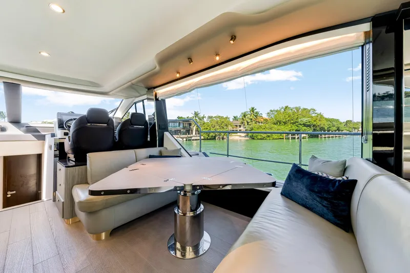 Slide: The Image of Luxurious interior of 2020 Azimut 60 Fly yacht with scenic water view. - 24