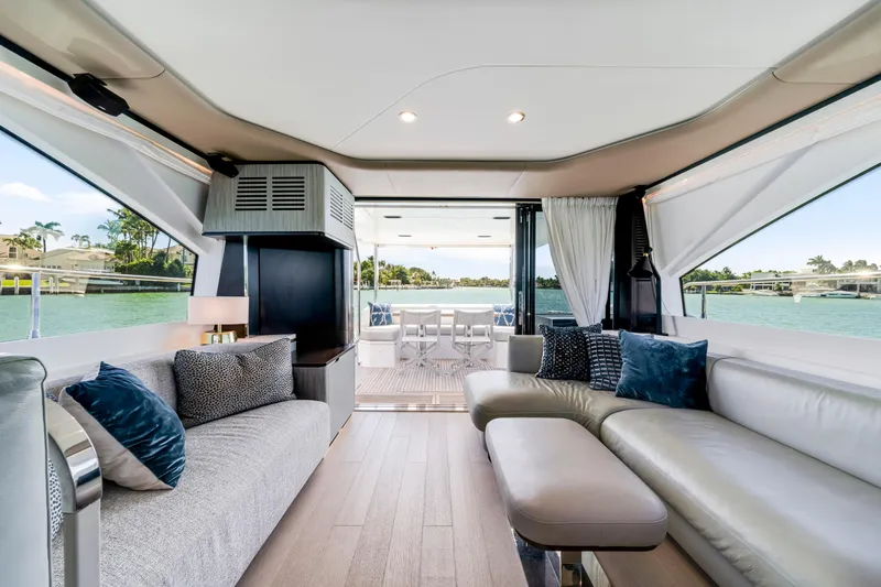 Slide: The Image of Luxurious interior of 2020 Azimut 60 Fly yacht with elegant seating and scenic water views. - 39