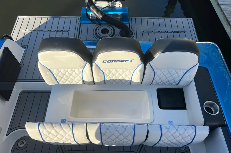 Slide: The Image of 2025 Concept 27' Open Deck boat seating with stylish white and blue upholstery. - 23