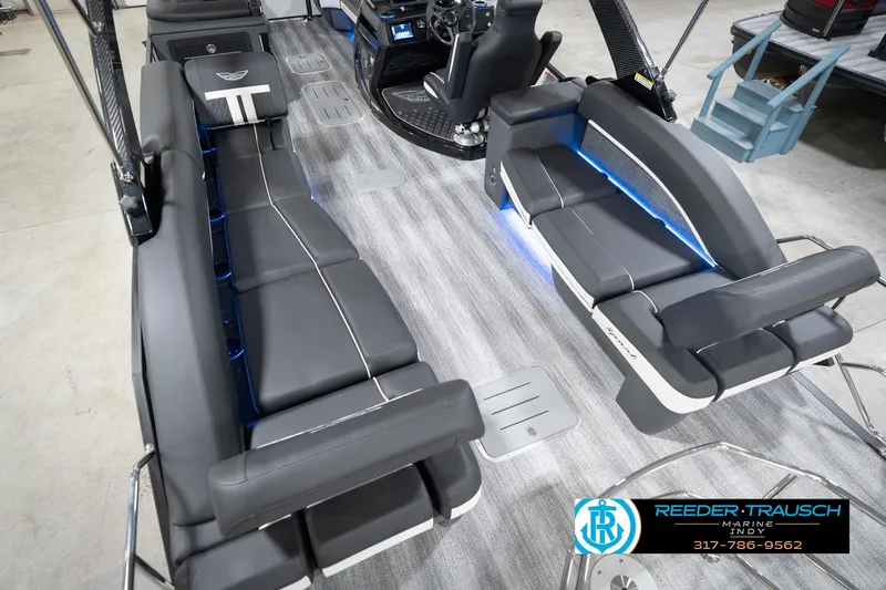 Slide: The Image of 2026 Bennington 24 MSL pontoon boat interior with sleek seating and modern design. - 15