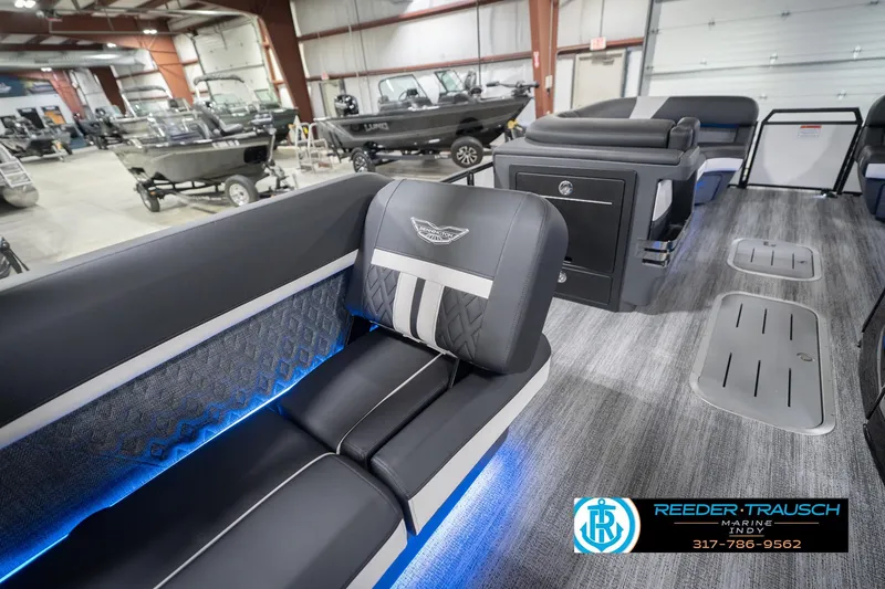 Slide: The Image of Interior of 2026 Bennington 24 MSL boat with luxurious seating and ambient lighting. - 28