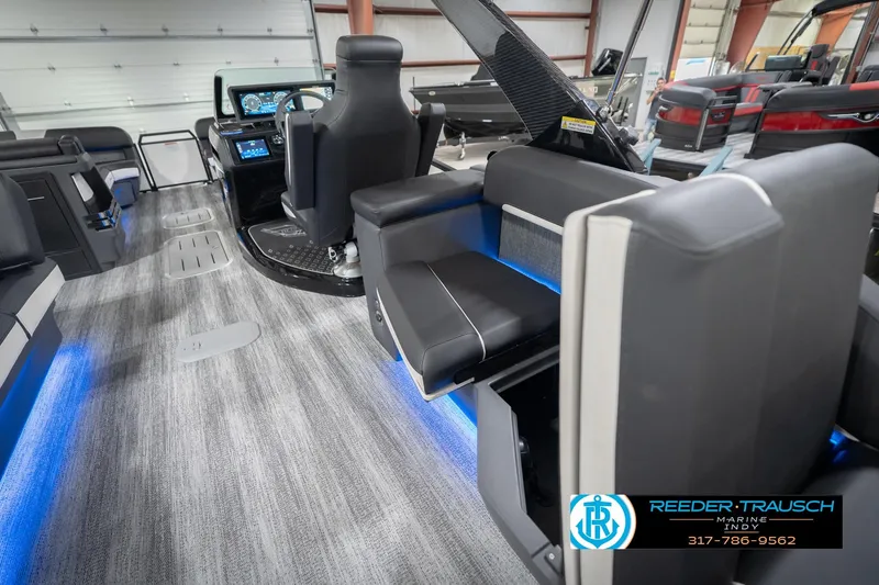Slide: The Image of 2026 Bennington 24 MSL boat interior with modern seating and illuminated flooring. - 33