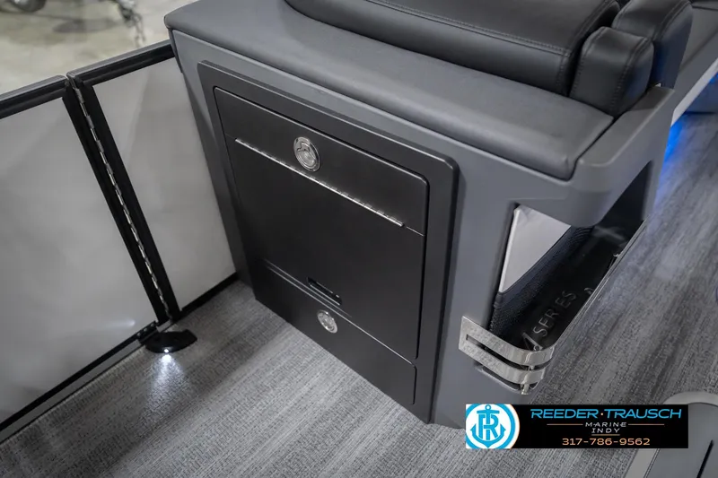 Slide: The Image of 2026 Bennington 24 MSL boat interior with storage compartment and seating. - 34