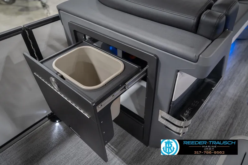 Slide: The Image of 2026 Bennington 24 MSL boat interior with pull-out trash compartment. - 35