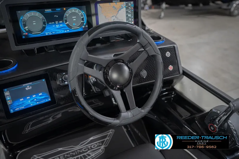 Slide: The Image of Steering console of 2026 Bennington 24 MSL with digital displays and controls. - 38