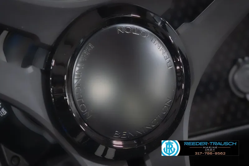 Slide: The Image of Close-up of 2026 Bennington 24 MSL steering wheel with Reeder-Trausch Marine logo. - 39