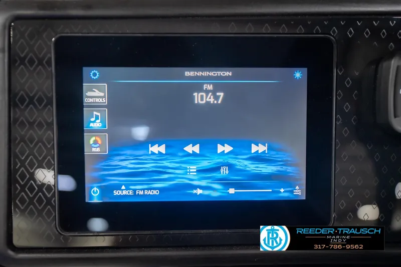 Slide: The Image of Touchscreen display of 2026 Bennington 24 MSL showing FM radio controls. - 40