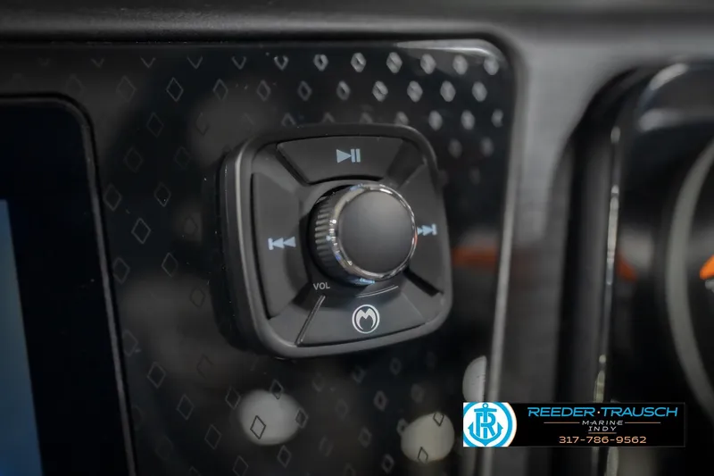 Slide: The Image of Control panel of 2026 Bennington 24 MSL boat with volume knob and buttons. - 41