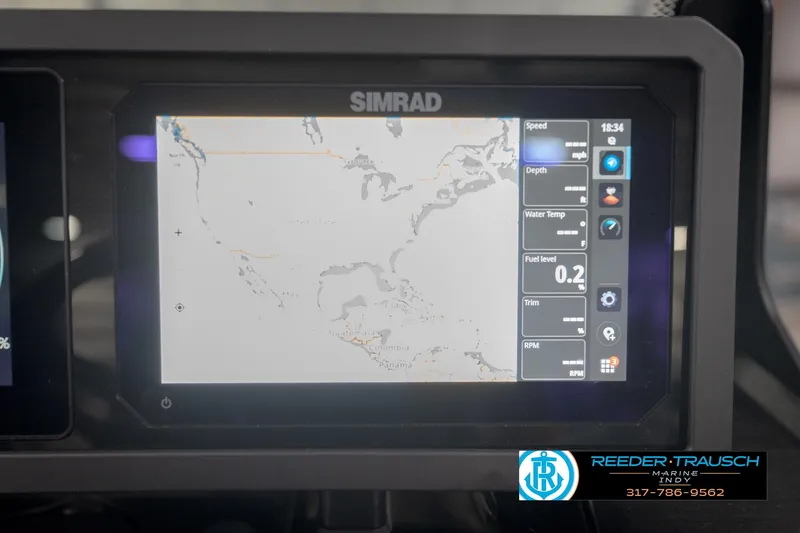 Slide: The Image of Simrad display on 2026 Bennington 24 MSL boat showing navigation and performance data. - 43