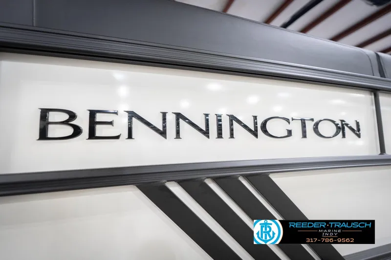 Slide: The Image of Close-up of 2026 Bennington 24 MSL boat logo with dealership branding. - 55