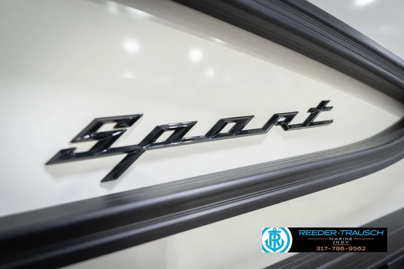 Slide: The Image of 2026 Bennington 24 MSL "Sport" emblem with Reeder-Trausch Marine logo. - 56