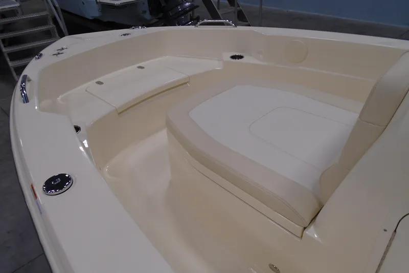 Slide: The Image of 2026 Scout 188 Sportfish boat interior with beige seating and sleek design. - 13