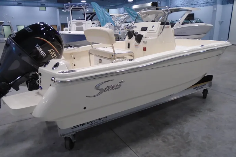 Slide: The Image of 2026 Scout 188 Sportfish boat with Yamaha outboard in showroom setting. - 3