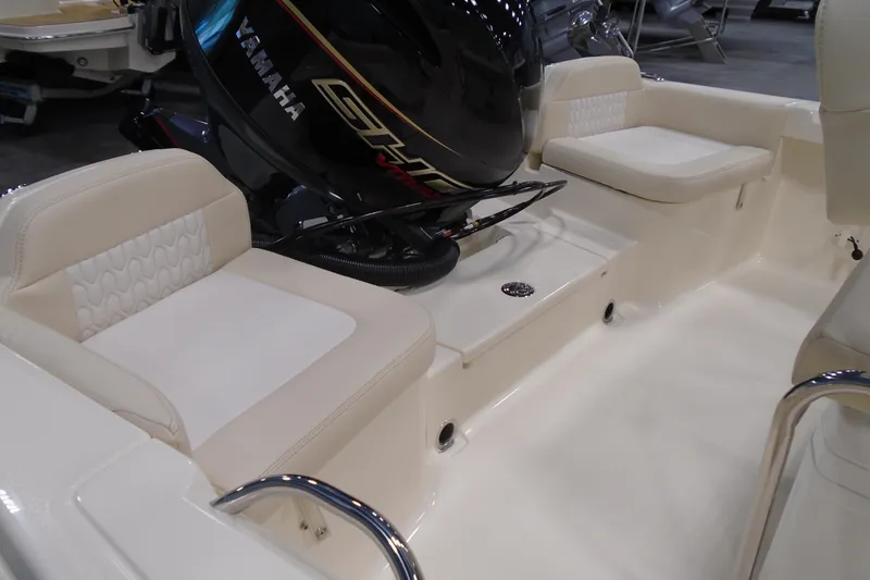 Slide: The Image of 2026 Scout 188 Sportfish boat interior with Yamaha engine, featuring comfortable seating. - 4