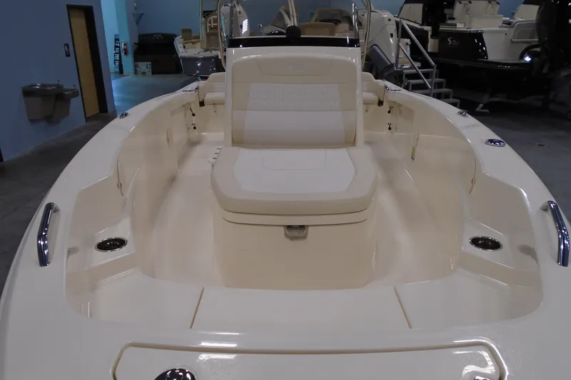 Slide: The Image of 2026 Scout 188 Sportfish boat interior with seating and storage features. - 9