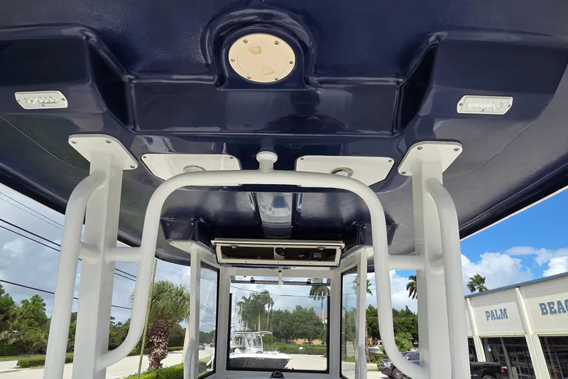 Slide: The Image of 2022 Robalo R272 Center Console boat interior with overhead view and structural details. - 4