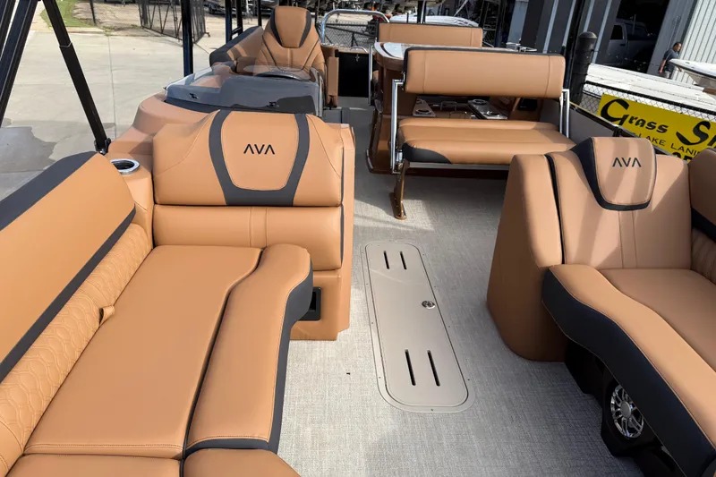 Slide: The Image of Luxurious seating on 2026 Avalon Catalina Entertainer Funship, featuring tan and black upholstery. - 12