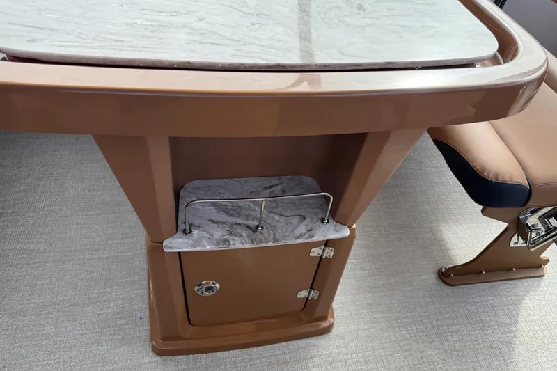 Slide: The Image of 2026 Avalon Catalina Entertainer Funship interior table and seating detail. - 37