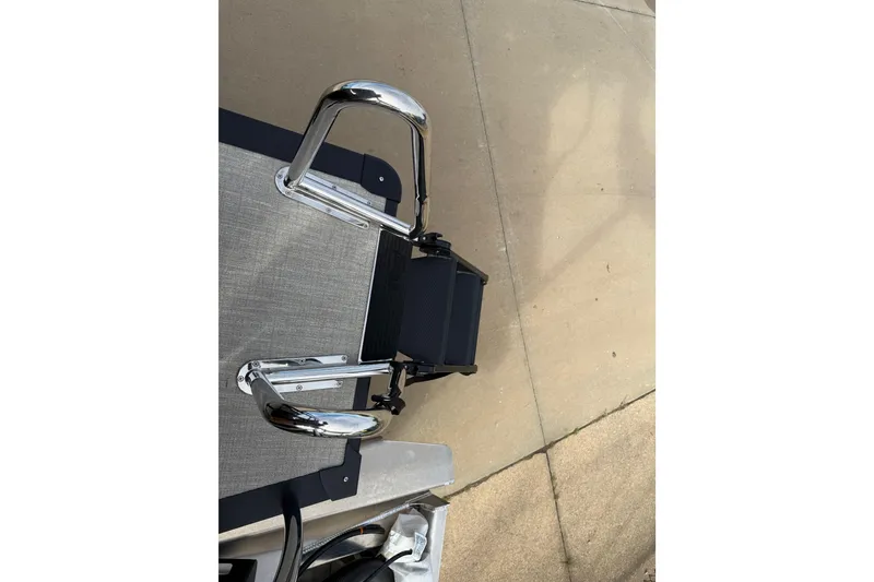 Slide: The Image of 2026 Avalon Catalina Entertainer Funship ladder on a concrete surface. - 46