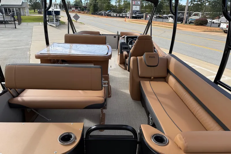 Slide: The Image of 2026 Avalon Catalina Entertainer Funship interior with tan seating and table setup. - 52