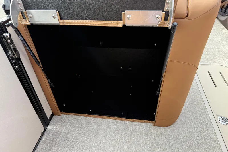 Slide: The Image of 2026 Avalon Catalina Entertainer Funship interior storage compartment with tan upholstery. - 53