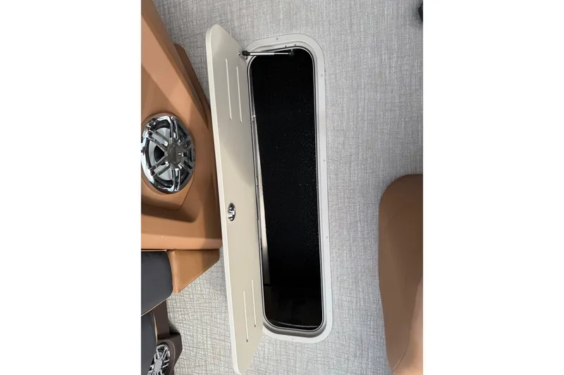 Slide: The Image of 2026 Avalon Catalina Entertainer Funship interior storage compartment with speaker detail. - 55