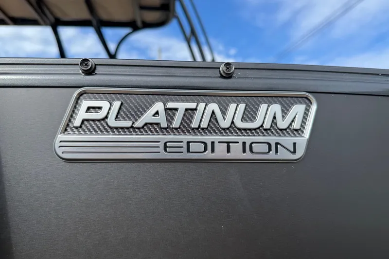 Slide: The Image of Platinum Edition badge on 2026 Avalon Catalina Entertainer Funship, close-up view. - 6