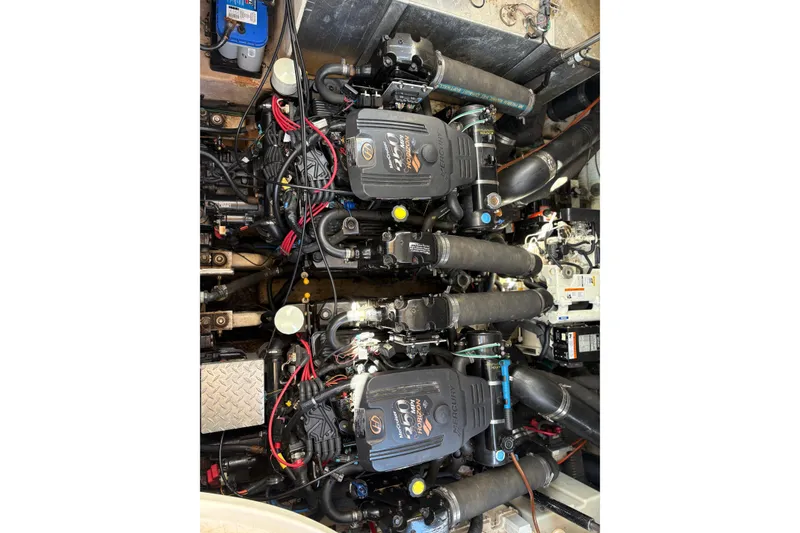 Slide: The Image of Engine compartment of a 2006 Sea Ray 320 Sundancer with twin MerCruiser engines. - 17