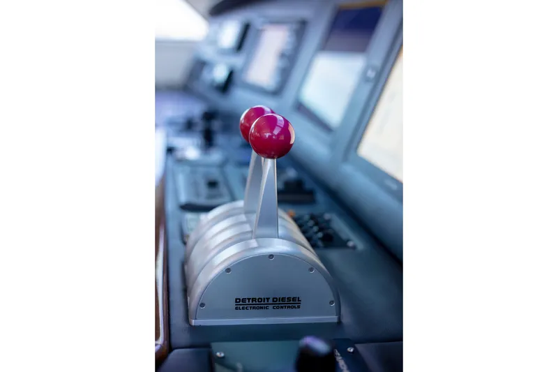 Slide: The Image of Control levers on 2002 Viking 65 Enclosed Bridge yacht, featuring Detroit Diesel electronic controls. - 40