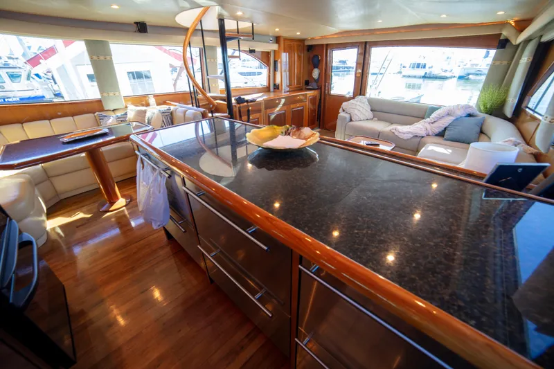 Slide: The Image of Luxurious interior of 2002 Viking 65 Enclosed Bridge yacht with modern furnishings. - 59