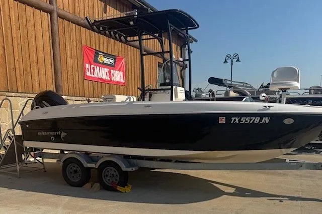 Slide: The Image of 2020 Bayliner Element F21 boat on trailer, displayed at clearance sale. - 1