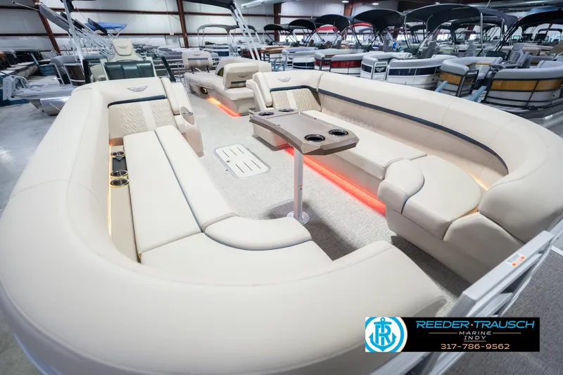 Slide: The Image of Luxurious interior of 2026 Bennington 26 MSL pontoon boat with elegant seating and ambient lighting. - 13