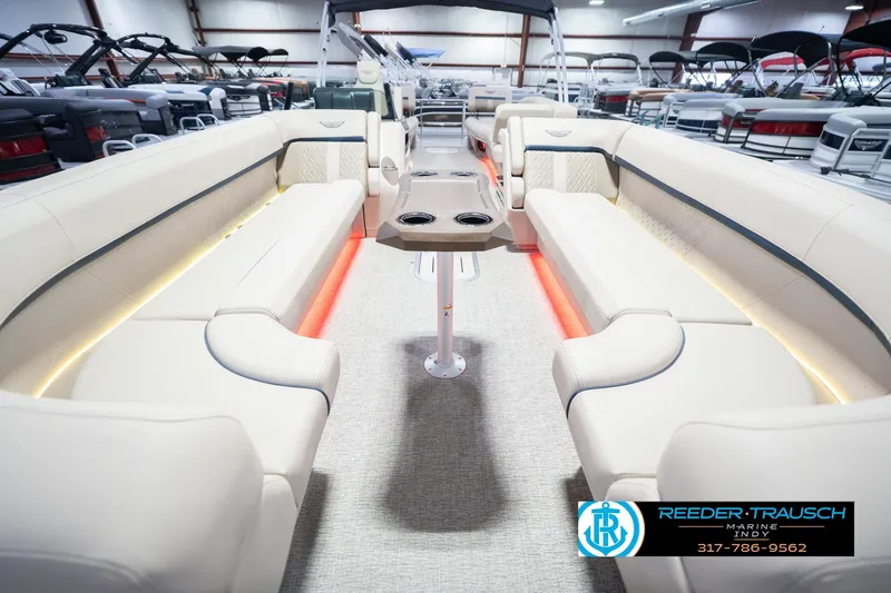 Slide: The Image of Luxurious interior of 2026 Bennington 26 MSL pontoon boat with elegant seating and ambient lighting. - 16