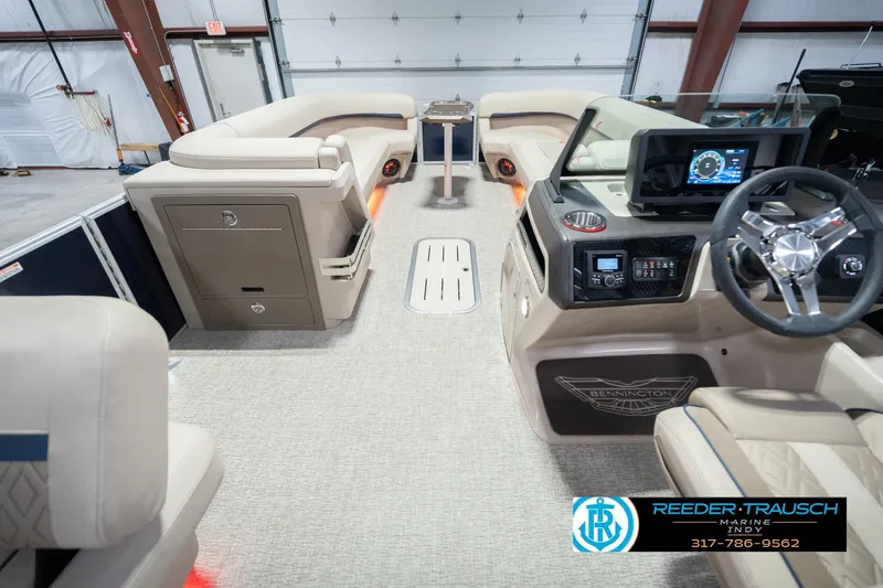 Slide: The Image of Interior of 2026 Bennington 26 MSL pontoon boat with modern dashboard and seating. - 20