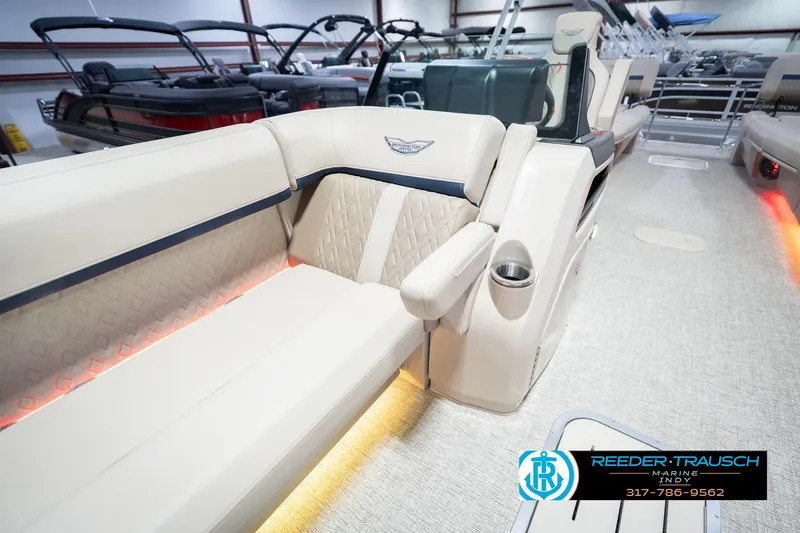 Slide: The Image of Luxurious interior of 2026 Bennington 26 MSL pontoon boat with elegant seating and ambient lighting. - 25