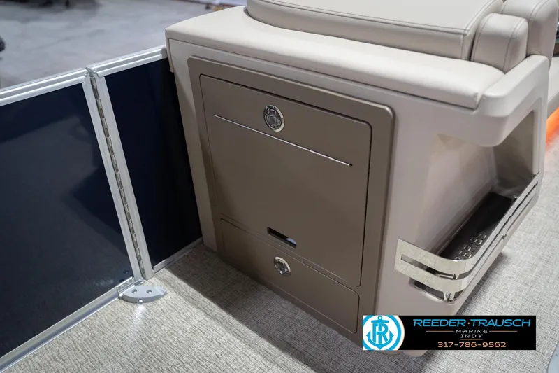 Slide: The Image of 2026 Bennington 26 MSL boat interior with storage compartment and seating. - 26