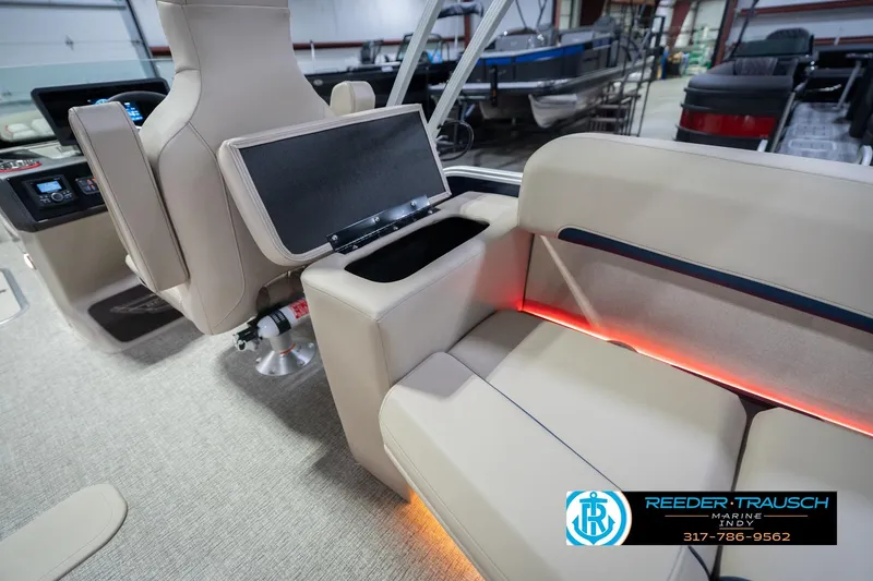 Slide: The Image of Interior of 2026 Bennington 26 MSL boat with beige seating and ambient lighting. - 38