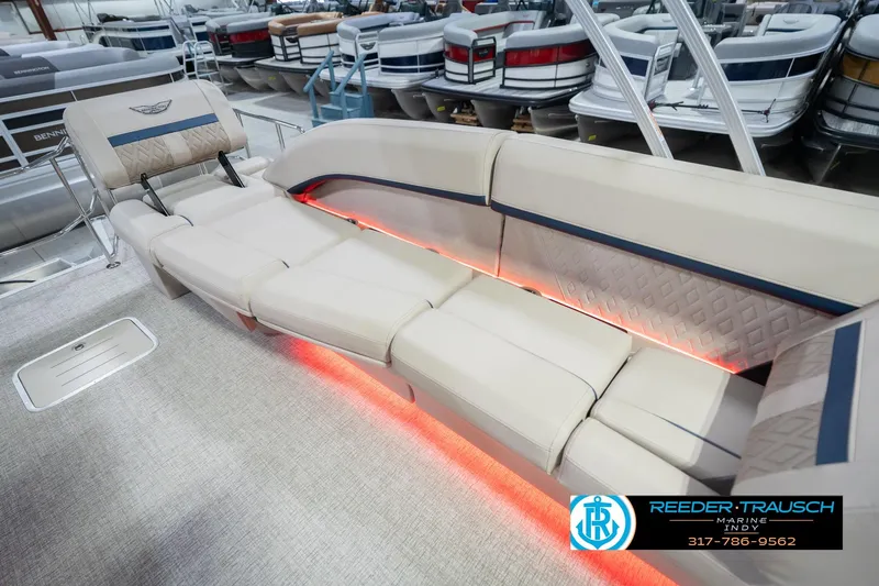 Slide: The Image of Luxurious seating on 2026 Bennington 26 MSL boat with ambient lighting, showcased at Reeder-Trausch Marine. - 49