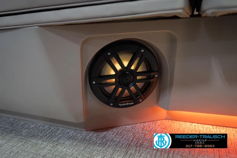 Slide: The Image of 2026 Bennington 26 MSL boat interior with illuminated speaker and ambient lighting. - 51