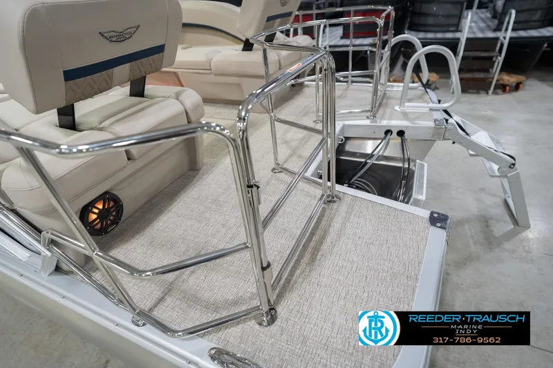 Slide: The Image of 2026 Bennington 26 MSL boat interior with seating and safety railings. - 58