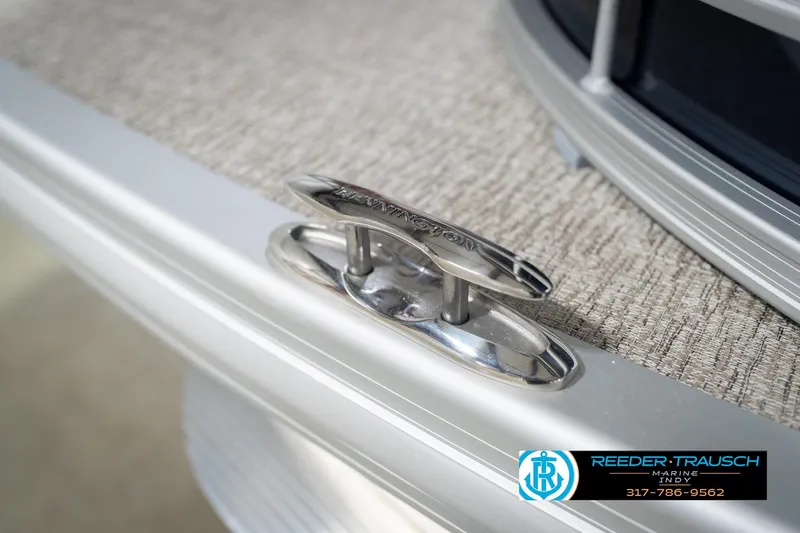 Slide: The Image of 2026 Bennington 26 MSL boat cleat detail with Reeder-Trausch Marine logo. - 61