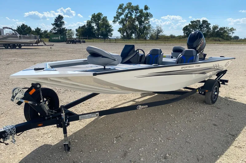 Slide: The Image of 2026 G3 Sportsman 1710SE boat on trailer, parked outdoors under a clear sky. - 3
