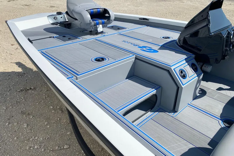 Slide: The Image of 2026 G3 Sportsman 1710SE boat deck with seating and storage compartments. - 7