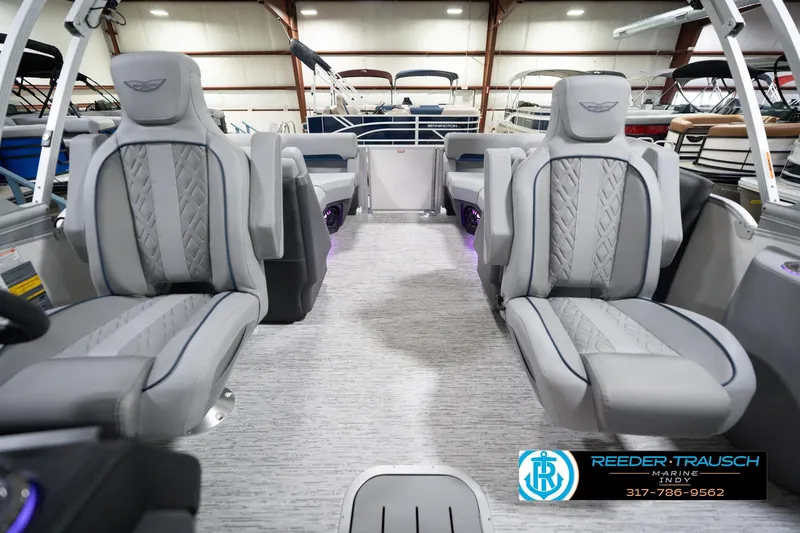 Slide: The Image of 2026 Bennington 22 MFB boat interior with luxurious gray seating and modern design. - 17