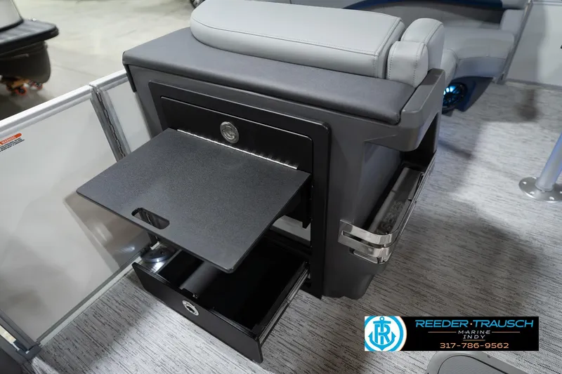 Slide: The Image of 2026 Bennington 22 MFB boat interior with storage compartment and seating. - 30