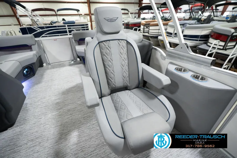 Slide: The Image of 2026 Bennington 22 MFB boat interior with luxurious seating and cup holders. - 32