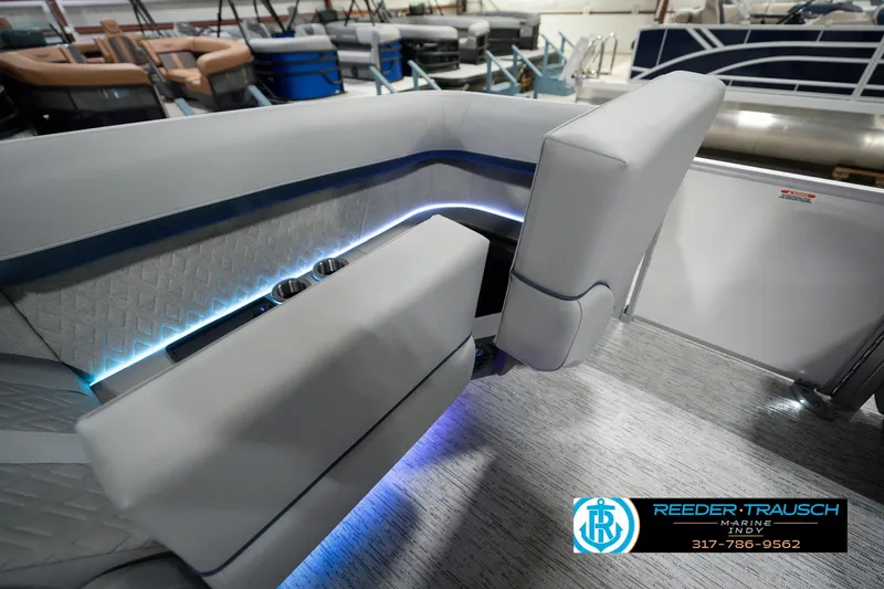 Slide: The Image of Interior of 2026 Bennington 22 MFB boat with modern seating and ambient lighting. - 34